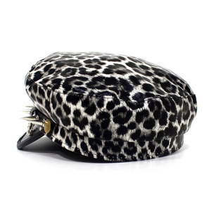 Detail of leopard print military cap with silver metal studs and punk rock style accents