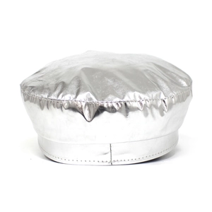 Detail of silver metallic punk beret featuring shiny fabric and punk style rivets