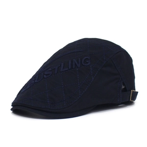 Dark blue quilted cotton flat cap with BUSTLING embroidery and adjustable buckle