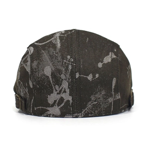 Rear view of brown cotton flat cap with gray abstract print and metal adjustment buckle