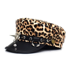 Detail view of leopard print military cap with metal spider brooch and punk rock silver studs