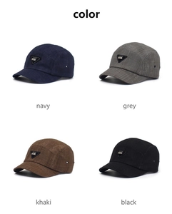 Detail of four 5-panel camping caps in navy, grey, khaki and black with triangle patches