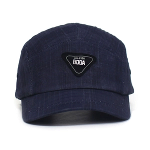 Adjustable dark blue 5-panel baseball cap with metal logo patch for outdoor sports