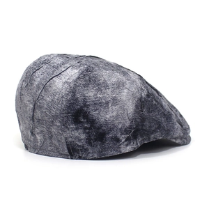 Detailed side view of duckbill cap with gray marble texture and wrinkled industrial design