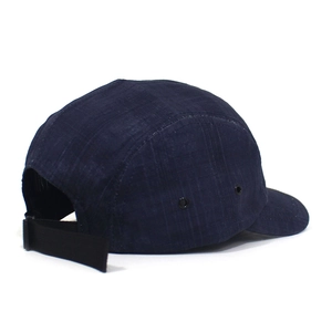 Rear view of navy blue 5-panel cap showing fabric texture and adjustable nylon strap