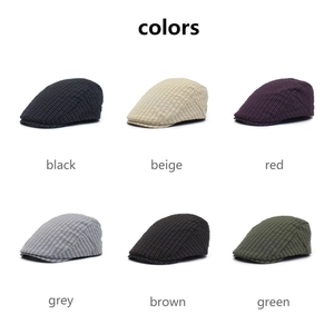 Detailed grid view showcasing six classic plaid flat caps in various color options
