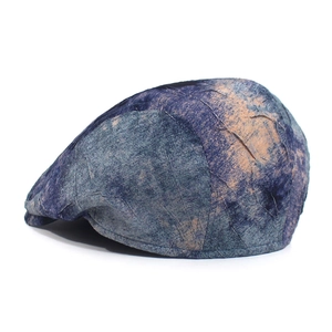 Macro detail of the retro ivy cap featuring abstract blue and orange marble texture