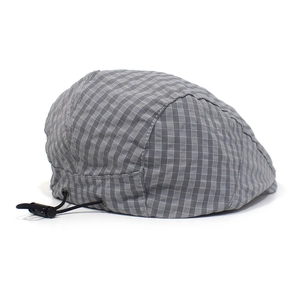 Detail of adjustable elastic drawstring and buckle on gray plaid quick-dry beret hat