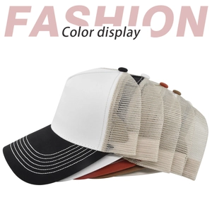 Multiple color mesh trucker hats showing breathable rear panels and curved brims