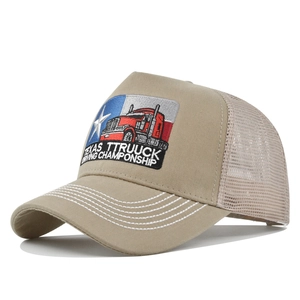 Detail of Texas Truck Driving Championship embroidery on khaki mesh trucker hat