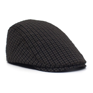 Macro detail of the dark brown plaid pattern on a quick-dry mesh beret flat cap