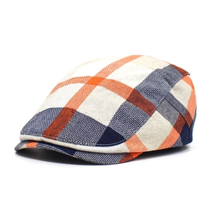 Classic British style plaid flat cap for men and women featuring colorful patchwork design