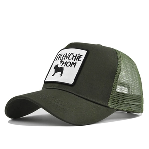 Detail view of Frenchie Mom embroidery and green mesh back on a trucker baseball cap