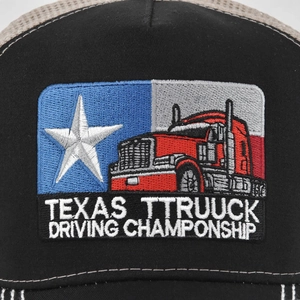 Black mesh trucker hat with Texas Truck Driving Championship embroidered patch on front