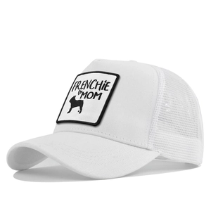 Detail of white trucker hat with Frenchie Mom embroidery and breathable mesh panels
