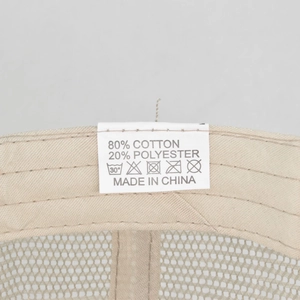 Close-up of internal wash label showing 80% cotton and 20% polyester blend fabric