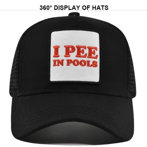 Classic black mesh trucker hat with humorous I PEE IN POOLS embroidery on white patch