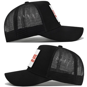 Detailed side view of black trucker hat with mesh panels and Free Tools embroidery