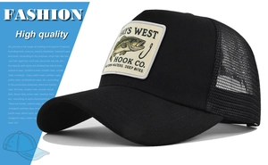 Detail of black mesh trucker hat featuring embroidered bass fish patch and curved brim