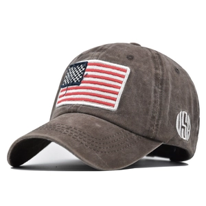Detail of vintage USA flag patch and 3D embroidery on a washed cotton baseball cap