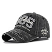 Broderie détaillée du lettrage 1985 sur casquette de baseball en denim noir délavé