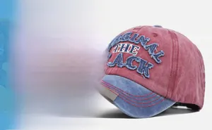 Detail of vintage washed baseball cap with 3D embroidery and red blue contrast design