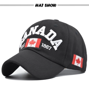 Detailed close-up of high-quality white embroidery on a black cotton baseball hat