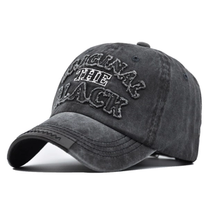Detail of 3D embroidered ORIGINAL text on washed vintage charcoal cotton baseball cap