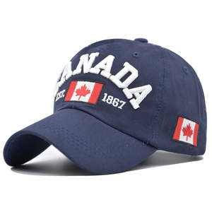 Close-up of a navy cotton baseball cap featuring 3D Canada embroidery and flag detail