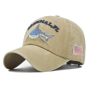 Detail of khaki washed cotton baseball cap with shark embroidery and US flag patch
