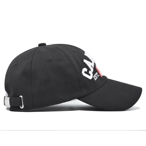 Side view of black baseball cap with white 3D embroidery and silver metal strap buckle