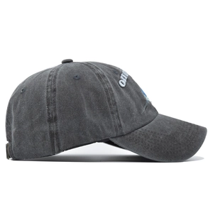 Detail of shark baseball cap with 3D embroidery on washed charcoal cotton fabric