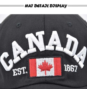 Macro shot of high-density CANADA 3D embroidery on black cotton twill baseball cap