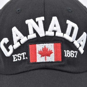 Black cotton baseball cap with white 3D Canada embroidery and flag patch detail