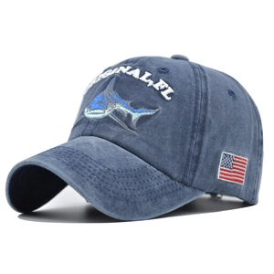 Washed navy blue baseball cap with 3D shark embroidery and American flag patch