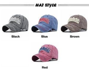 Close-up of vintage washed baseball caps with 3D athletic embroidery in four colors