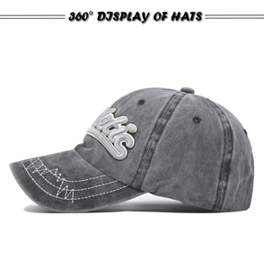 Detailed side view of washed cotton baseball cap with 3D Notis embroidery and stitching