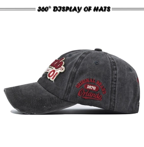 Close-up of vintage washed baseball cap with 3D embroidery and distressed brim details