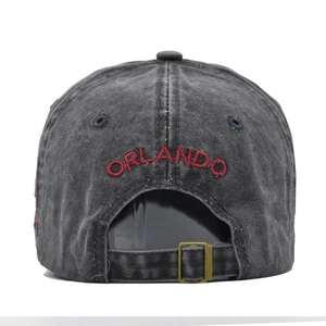 Detail view of the washed cotton baseball cap featuring red 3D Orlando embroidery