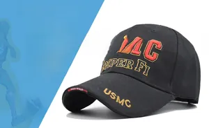 Detail view of high-quality USMC embroidery on a black cotton tactical baseball cap
