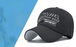 Detail of black cotton baseball cap with white 3D embroidery and durable metal eyelets