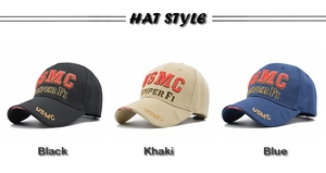 Detailed close-up of USMC tactical baseball caps in black, khaki, and navy blue colors
