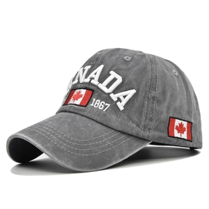 Close-up of vintage washed gray cotton baseball cap with Canada maple leaf embroidery
