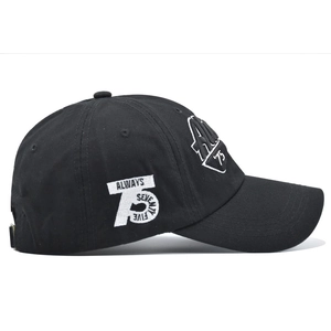 Detail showing white embroidery of Always Seventy Five and number 75 on a black baseball cap