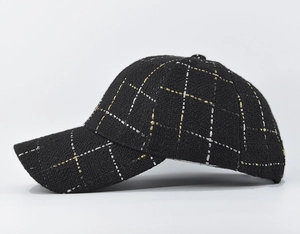 Detail of plaid baseball cap with gold metallic thread and tweed texture