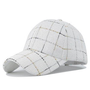 Elegant white tweed baseball cap with black and gold thread woven plaid pattern for women