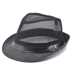 Detail of vintage black jazz hat featuring breathable mesh crown and leather belt buckle