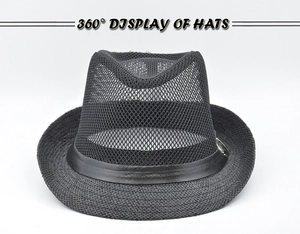 Detail of black fedora hat featuring breathable mesh crown and leather belt with metal ring