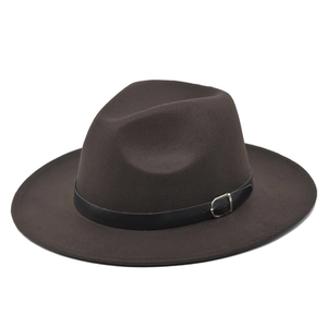 Detail of a dark brown wool fedora hat featuring a black leather band and silver buckle