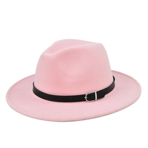 Detail of pink wool fedora hat featuring a stylish black leather band with silver buckle
